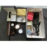 A box containing a large quantity of modern watches