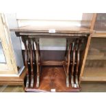 A nest of three reproduction mahogany occasional tables