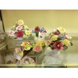 A collection of six ceramic floral bouquets mainly by Adderley and Aynsley