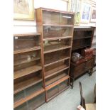 A mid-20th century nine sectioned glazed bookcase