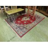 A modern Persian style red ground rug