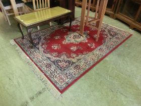A modern Persian style red ground rug