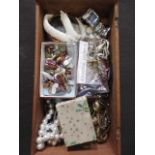 A box containing a quantity of costume jewellery