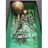 A box containing a quantity of old keys, funnel etc.