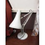 A white angle poise style lamp