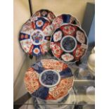 A selection of five Imari style plates