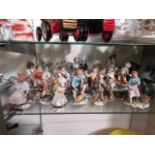 A large selection of mainly Capodimonte figurines of children