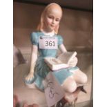 A Royal Doulton figurine 'Alice' HN2158