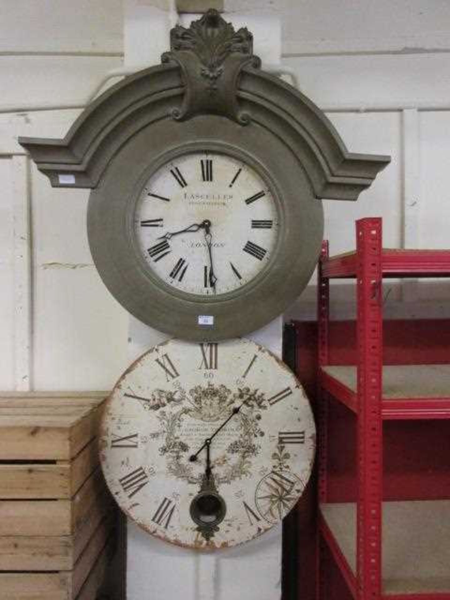 Two quartz wall clocks