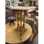 A mid-20th century pedestal occasional table