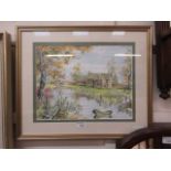 A framed and glazed watercolour of cottage scene with river and bridge
