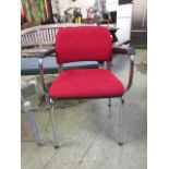 A chrome based red upholstered open armchair possibly by Sedus