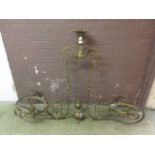 An early 20th century brass billiard table ceiling hanging light fitting
