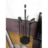 A modern wellie stand in the form of golf clubs