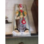 A moulded plaque of clown