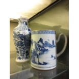 A blue and white oriental vase along with a blue and white oriental style large mugChips round