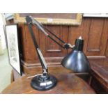 A 'Thousand And One Lamps Ltd' angle poise style lamp