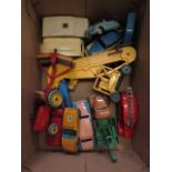 A box containing diecast caravans, trucks, tractors etc.