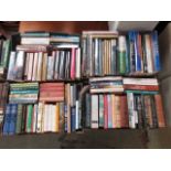 Four trays of hardback books on various subjects to include travel