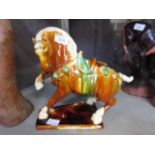 A ceramic Tang Sancai style horse with Chinese marking to base