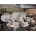 A Royal Doulton 'Carnation' tea set comprising of cups, saucers, cream jug, teapot, etc