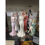 A collection ceramic and moulded figures of young ladies