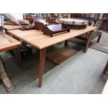 A modern oak extending dining table