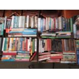 Four trays of books on various subjects to include travel