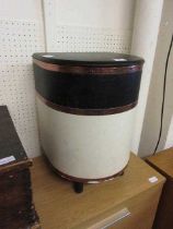 A mid-20th century stool with lift up lid
