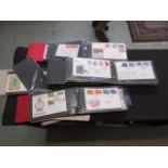 Four albums and a quantity of loose First Day covers