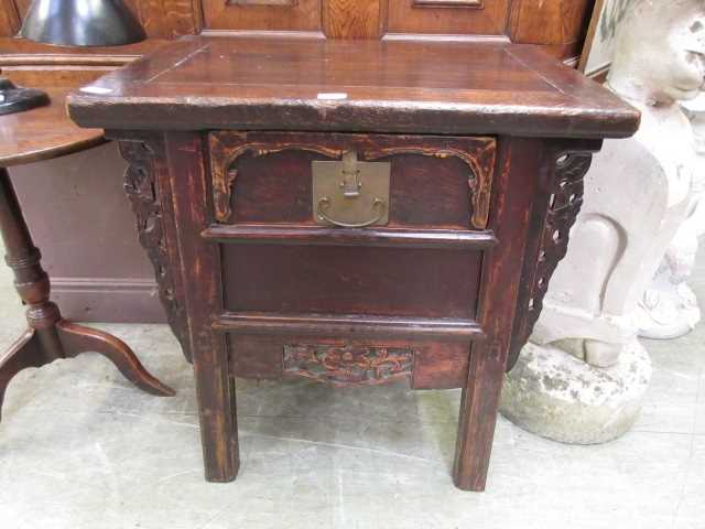 An eastern hardwood cabinet having single drawer