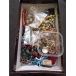 A box containing a quantity of costume jewellery