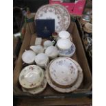 A tray containing decorative tea ware to include bowls, cups, saucers etc.