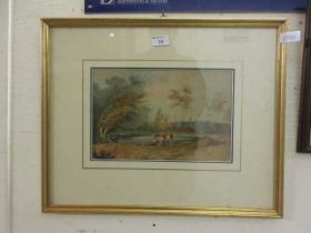 A framed and glazed watercolour of cattle by pond scene signed W.B.Henley