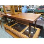 A mid-20th century teak coffee table