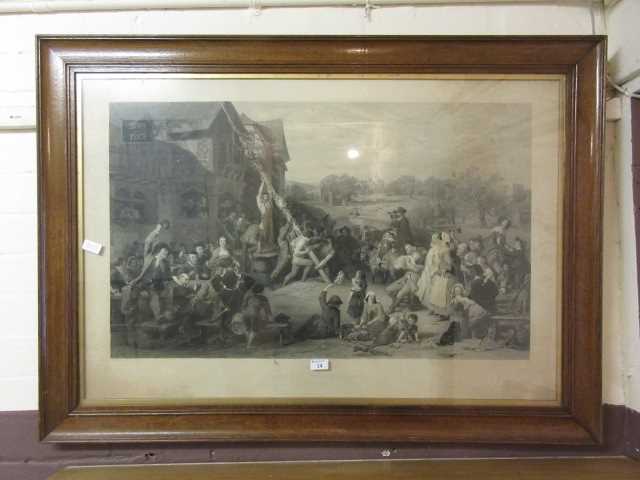 A framed and glazed monochrome etching 'Raising The May-Pole' after F.Goodall