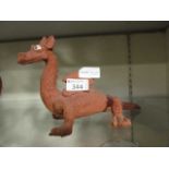 A hand moulded clay model of dragon
