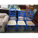 A set of five plus one blue painted seagrass seated chairs