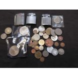 A bag containing a quantity of collector's coins, other currency, cigarette lighters, etc