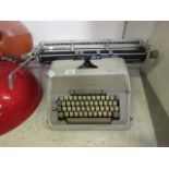 A mid-20th century Alder typewriter