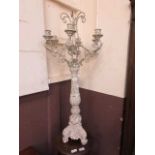 A reproduction part painted candelabra