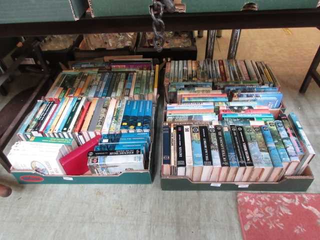 Four trays of books mainly on travel