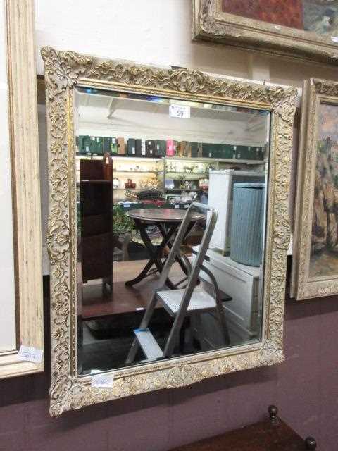 A part gilt framed bevel glass mirror