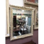 A part gilt framed bevel glass mirror