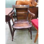 A beech and elm seated open arm rail back chair