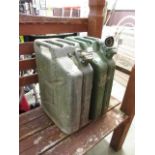 Two green jerry cans