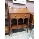 An Edwardian mahogany bureau, the fall front above single drawer above open storage