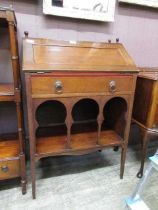 An Edwardian mahogany bureau, the fall front above single drawer above open storage