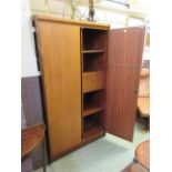 A mid-20th century teak two door wardrobe