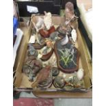 A tray containing moulded models of birds and other animals